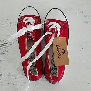 Red and white tennis shoes